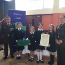 Members of the Defence Forces with Blátnid, Aisling, Saoirse and Lydia